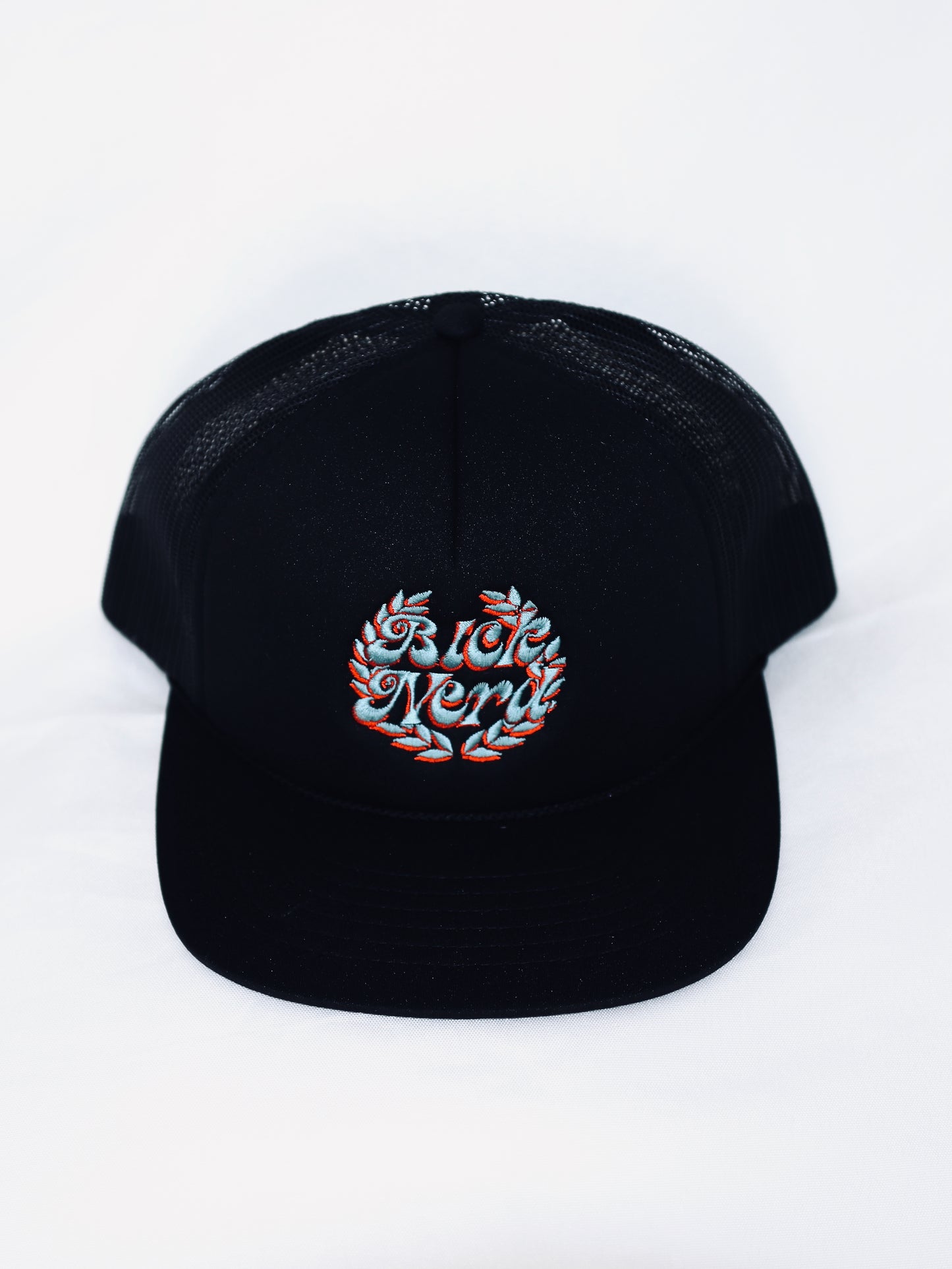 BLCK NERD BLCK W/RD-BLU EMBRIODERED TRUCKER