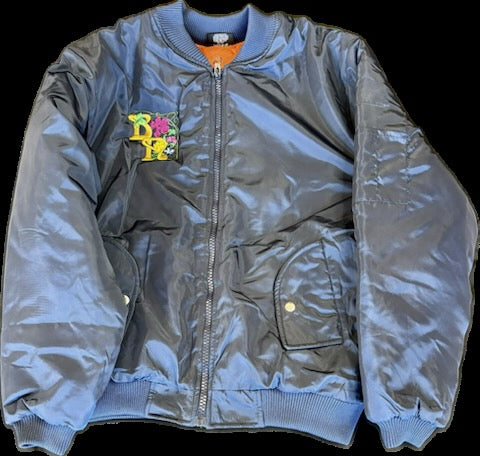 Gray bomber jacket with colorful patch on a black background